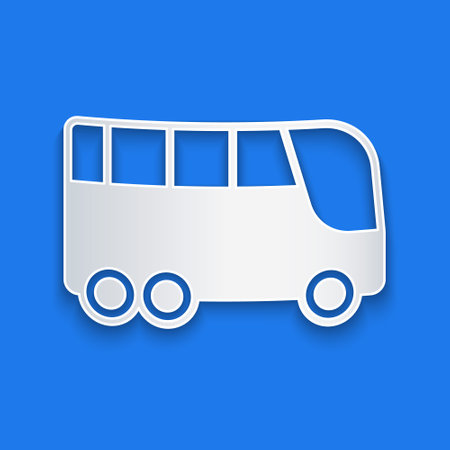 Paper cut Bus icon isolated on blue background. Transportation concept. Bus tour transport. Tourism or public vehicle symbol. Paper art style. Vectorのイラスト素材