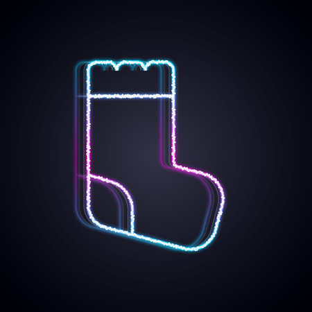 Glowing neon line Baby socks clothes icon isolated on black background. Vectorのイラスト素材