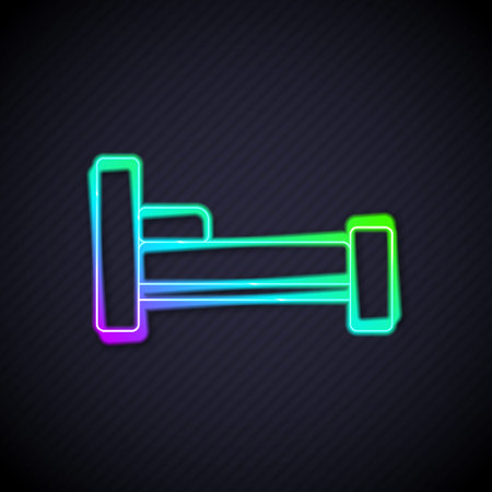 Glowing neon line Bed icon isolated on black background. Vectorのイラスト素材