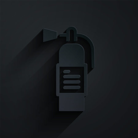 Paper cut Fire extinguisher icon isolated on black background. Paper art style. Vectorのイラスト素材