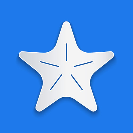 Paper cut Starfish icon isolated on blue background. Paper art style. Vector.のイラスト素材