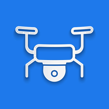 Paper cut Drone flying icon isolated on blue background. Quadrocopter with video and photo camera symbol. Paper art style. Vector.のイラスト素材