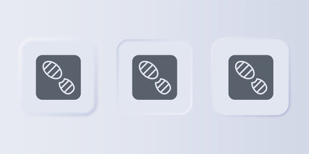 Gray Human footprints shoes icon isolated on gray background. Shoes sole. Set icons in square buttons. Vector.のイラスト素材