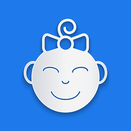 Paper cut Happy little girl head icon isolated on blue background. Face of baby girl. Paper art style. Vector.のイラスト素材