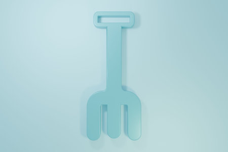 Blue Garden rake icon isolated on blue background. Tool for horticulture, agriculture, farming. Ground cultivator. Housekeeping equipment. Minimalism concept. 3D render illustration.の写真素材