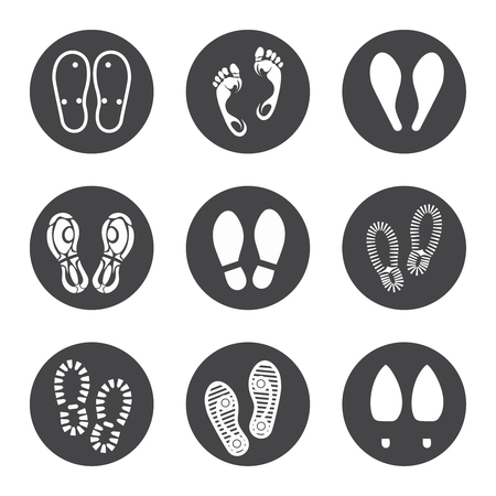 Footprint icons set vector illustration. Barefoot prints and boots footrints iconsのイラスト素材