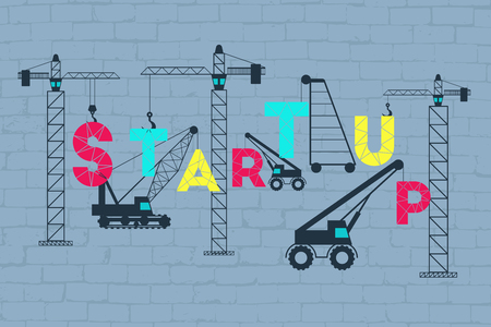 Business startup concept. Construction site working on lifting the startup wording.のイラスト素材