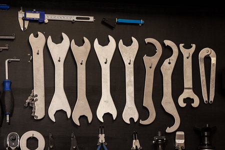 Tools hanging on wall in workshop room.の写真素材