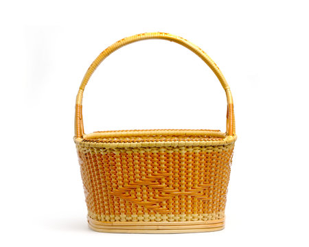Wicker fruit basket isolate on white background.