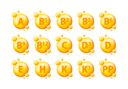 Multi Vitamin complex icons. Golden round capsules. Essential vitamin complexのイラスト素材