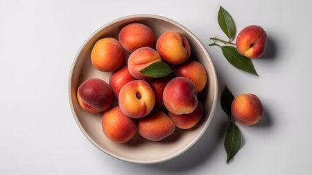 Peaches lie in a plate top view on a white background. Generative AIの素材