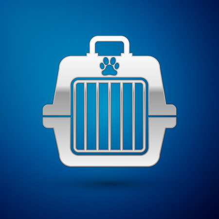 Silver Pet carry case icon isolated on blue background. Carrier for animals, dog and cat. Container for animals. Animal transport box. Vector Illustrationのイラスト素材