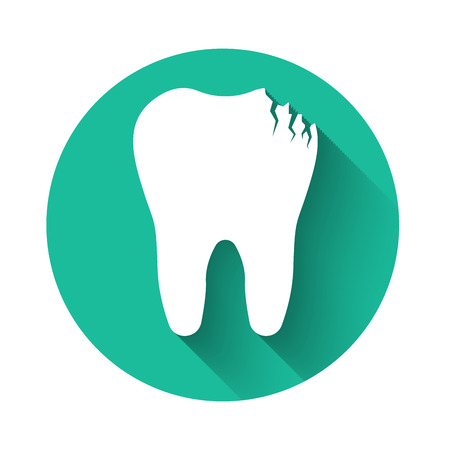 White Broken tooth icon isolated with long shadow. Dental problem icon. Dental care symbol. Green circle button. Vector Illustrationのイラスト素材