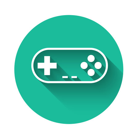 White Gamepad icon isolated with long shadow. Game controller. Green circle button. Vector...