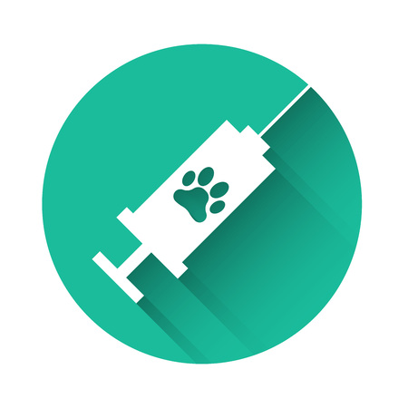 White Syringe with pet vaccine icon isolated with long shadow. Dog or cat paw print. Green circle button. Vector Illustrationのイラスト素材