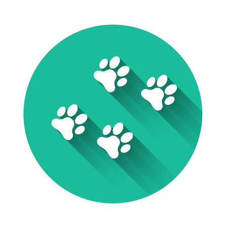 White Paw print icon isolated with long shadow. Dog or cat paw print. Animal track. Green circle button. Vector Illustrationのイラスト素材
