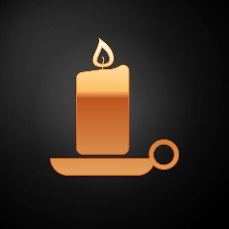 Gold Burning candle in candlestick icon isolated on black background. Old fashioned lit candle. Cylindrical aromatic candle stick with burning flame. Vector Illustrationのイラスト素材