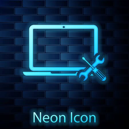 Glowing neon Laptop with screwdriver and wrench icon isolated on brick wall background. Adjusting, service, setting, maintenance, repair, fixing. Vector Illustration