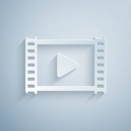 Paper cut Play Video icon isolated on grey background. Film strip with play sign. Paper art style. Vector Illustrationのイラスト素材