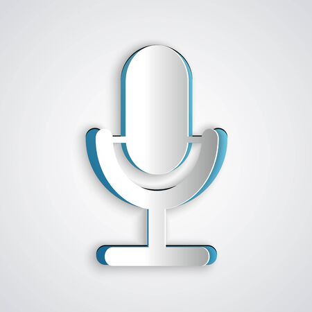 Paper cut Microphone icon isolated on grey background. On air radio mic microphone. Speaker sign. Paper art style. Vector Illustrationのイラスト素材