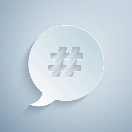 Paper cut Hashtag speech bubble icon isolated on grey background. Concept of number sign, social media marketing, micro blogging. Paper art style. Vector Illustrationのイラスト素材