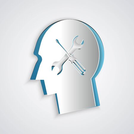 Paper cut Human head with with screwdriver and wrench icon isolated on grey background. Artificial intelligence. Symbol work of brain. Paper art style. Vector Illustrationのイラスト素材