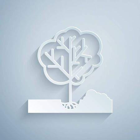 Paper cut Planting a tree in the ground icon isolated on grey background. Gardening, agriculture, caring for environment. Paper art style. Vector Illustrationのイラスト素材