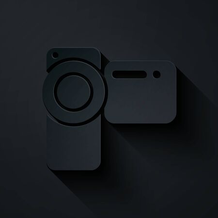 Paper cut Cinema camera icon isolated on black background. Video camera. Movie sign. Film projector. Paper art style. Vector Illustrationのイラスト素材