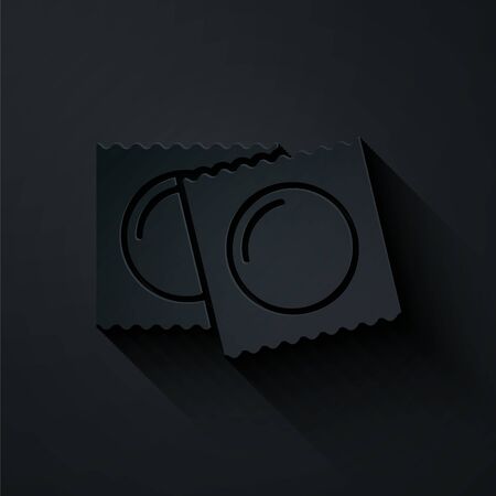 Paper cut Condoms in package safe sex icon isolated on black background. Safe love symbol. Contraceptive method for male. Paper art style. Vector Illustrationのイラスト素材