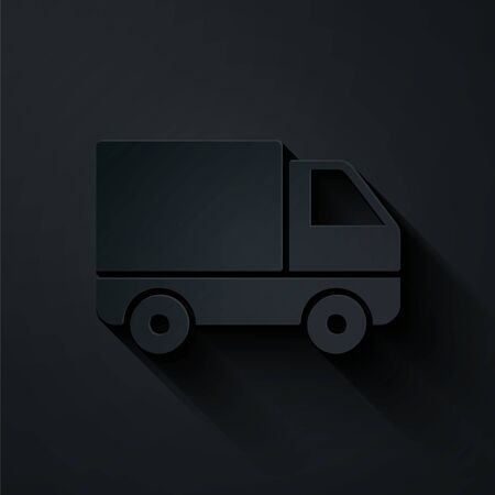 Paper cut Delivery cargo truck vehicle icon isolated on black background. Paper art style. Vector Illustrationのイラスト素材