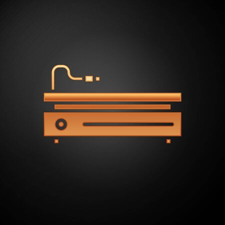 Gold Video game console icon isolated on black background. Vector Illustrationのイラスト素材