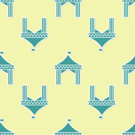 Green Camping tent icon isolated seamless pattern on yellow background. Carnival camping tent. Amusement park. Vector Illustrationのイラスト素材