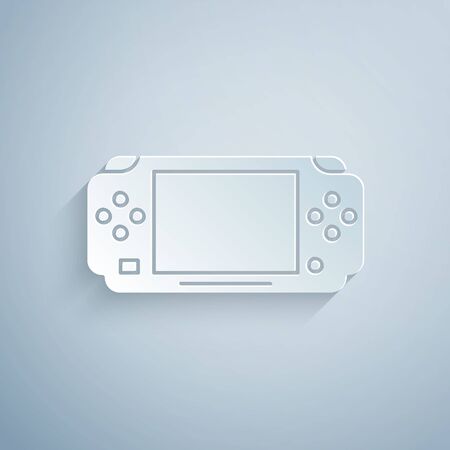 Paper cut Portable video game console icon isolated on grey background. Gamepad sign. Gaming concept. Paper art style. Vector Illustrationのイラスト素材