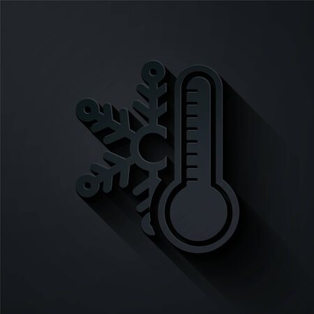 Paper cut Thermometer with snowflake icon isolated on black background. Paper art style. Vector Illustrationのイラスト素材