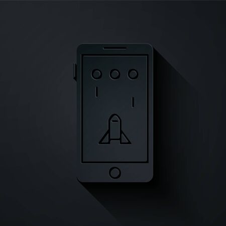Paper cut Smartphone and playing in game icon isolated on black background. Mobile gaming concept. Paper art style. Vector Illustrationのイラスト素材