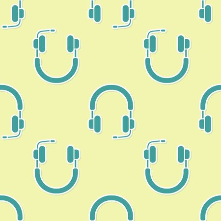 Green Headphones icon isolated seamless pattern on yellow background. Earphones. Concept for listening to music, service, communication and operator. Vector Illustrationのイラスト素材