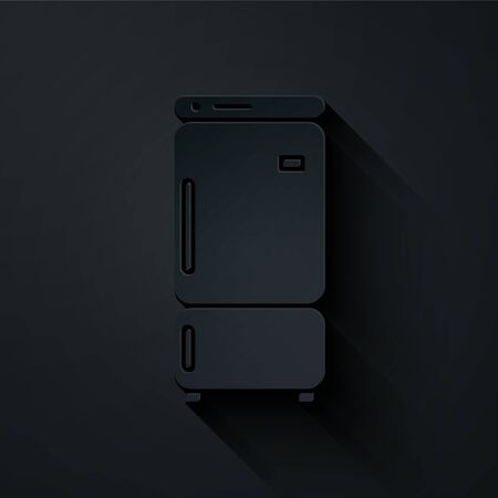 Paper cut Refrigerator icon isolated on black background. Fridge freezer refrigerator. Household tech and appliances. Paper art style. Vector Illustrationのイラスト素材