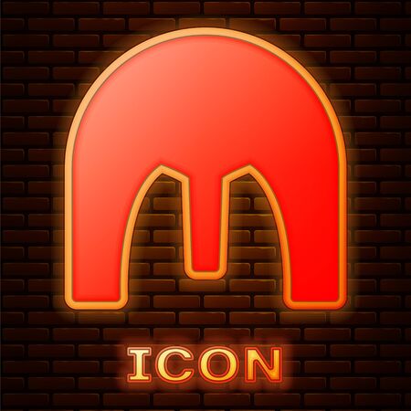 Glowing neon Medieval iron helmet for head protection icon isolated on brick wall background. Vector Illustrationのイラスト素材