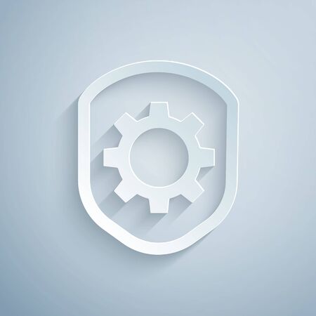 Paper cut Shield with settings gear icon isolated on grey background. Adjusting, service, maintenance, repair, fixing. Paper art style. Vector Illustrationのイラスト素材