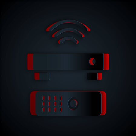 Paper cut Wireless multimedia and TV box receiver and player with remote controller icon isolated on black background. Paper art style. Vector.のイラスト素材