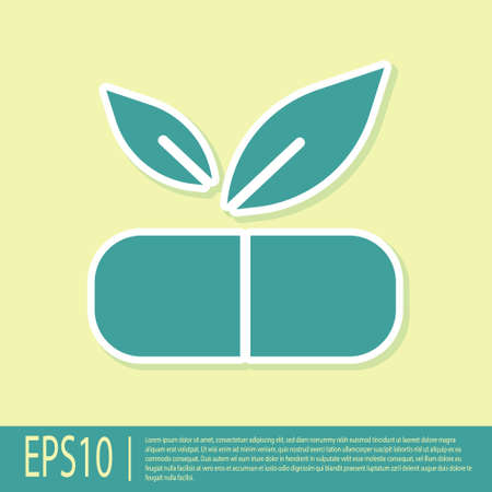 Green Medical pill with plant icon isolated on yellow background. Herbal pill. Vector.のイラスト素材