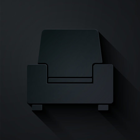 Paper cut Armchair icon isolated on black background. Paper art style. Vectorのイラスト素材