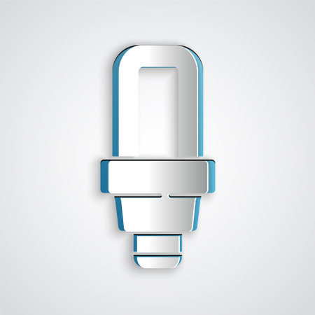Paper cut LED light bulb icon isolated on grey background. Economical LED illuminated lightbulb. Save energy lamp. Paper art style. Vectorのイラスト素材