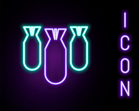 Glowing neon line Aviation bombs icon isolated on black background. Rocket bomb flies down. Colorful outline concept. Vectorのイラスト素材