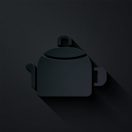 Paper cut Kettle with handle icon isolated on black background. Teapot icon. Paper art style. Vectorのイラスト素材