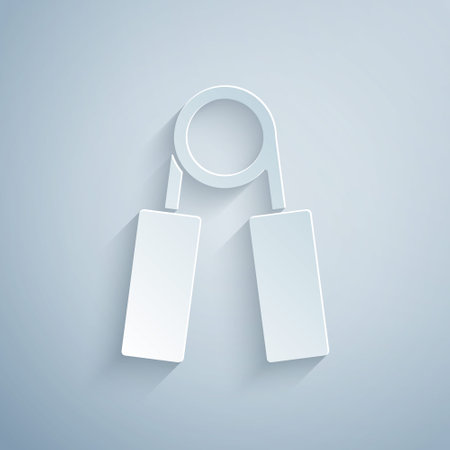 Paper cut Sport hand grip expander icon isolated on grey background. Sport equipment. Paper art style. Vectorのイラスト素材