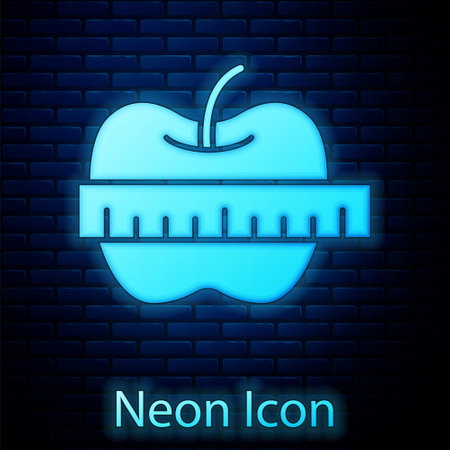 Glowing neon Apple and measuring tape icon isolated on brick wall background. Excess weight. Healthy diet menu. Fitness diet apple. Vectorのイラスト素材