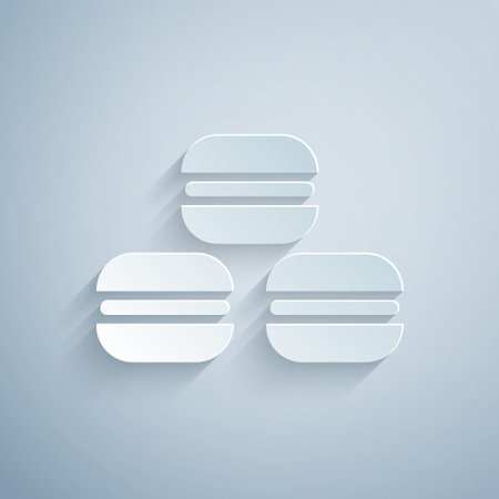 Paper cut Macaron cookie icon isolated on grey background. Macaroon sweet bakery. Paper art style. Vectorのイラスト素材