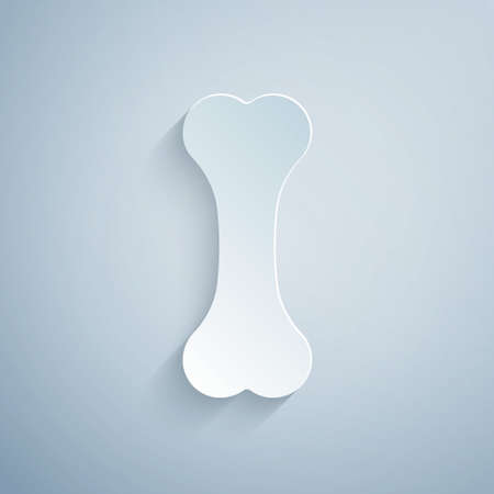 Paper cut Dog bone icon isolated on grey background. Pets food symbol. Paper art style. Vectorのイラスト素材