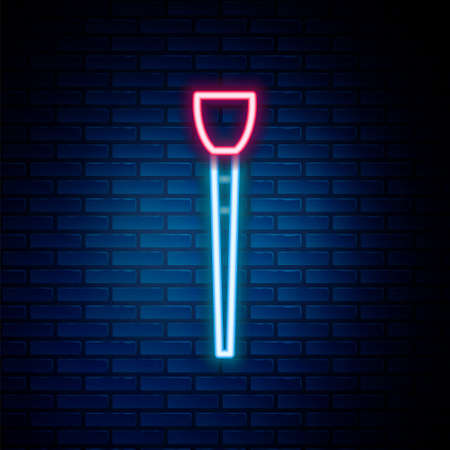Glowing neon line Makeup brush icon isolated on brick wall background. Colorful outline concept. Vectorのイラスト素材